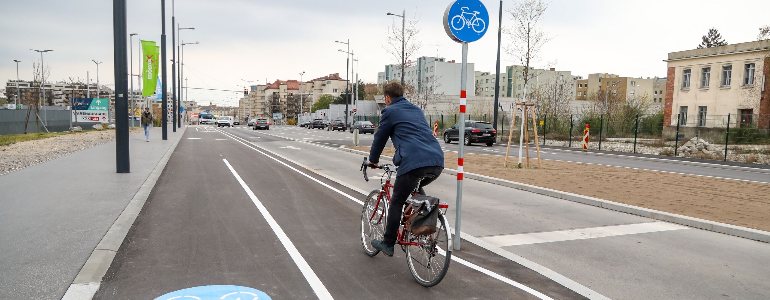 Radfahrer in der Franz-Grill-Straße, © PID/Christian Fürthner