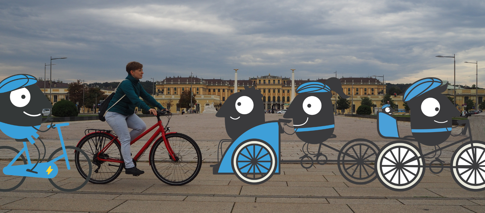 Radfahrerin vor Schloss Schönbrunn. Am Bild zu sehen sind auch die Maskottchen der Mobiltätswoche, die Fahrrad fahren.